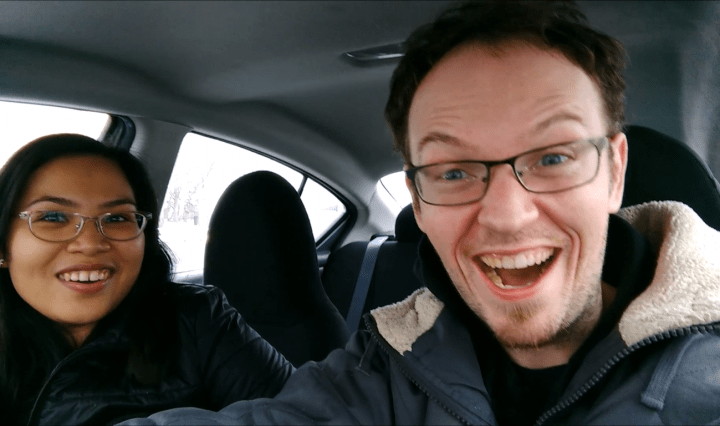 happy couple in a car